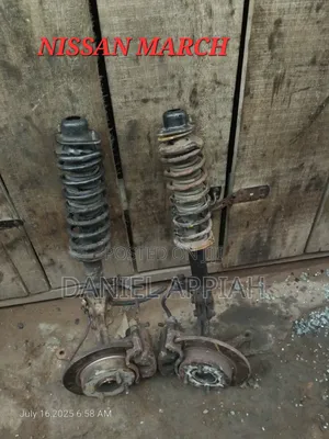 Nissan March 2000 Front Shocks and Hub