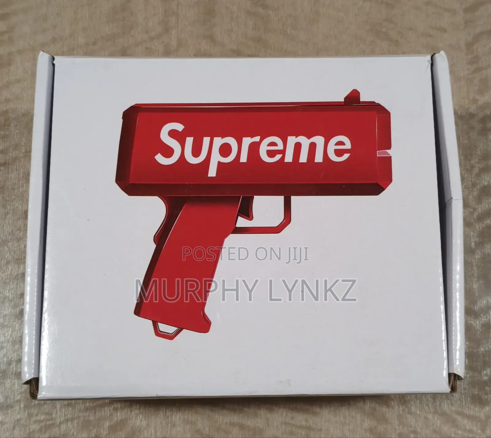 Supreme Money Gun