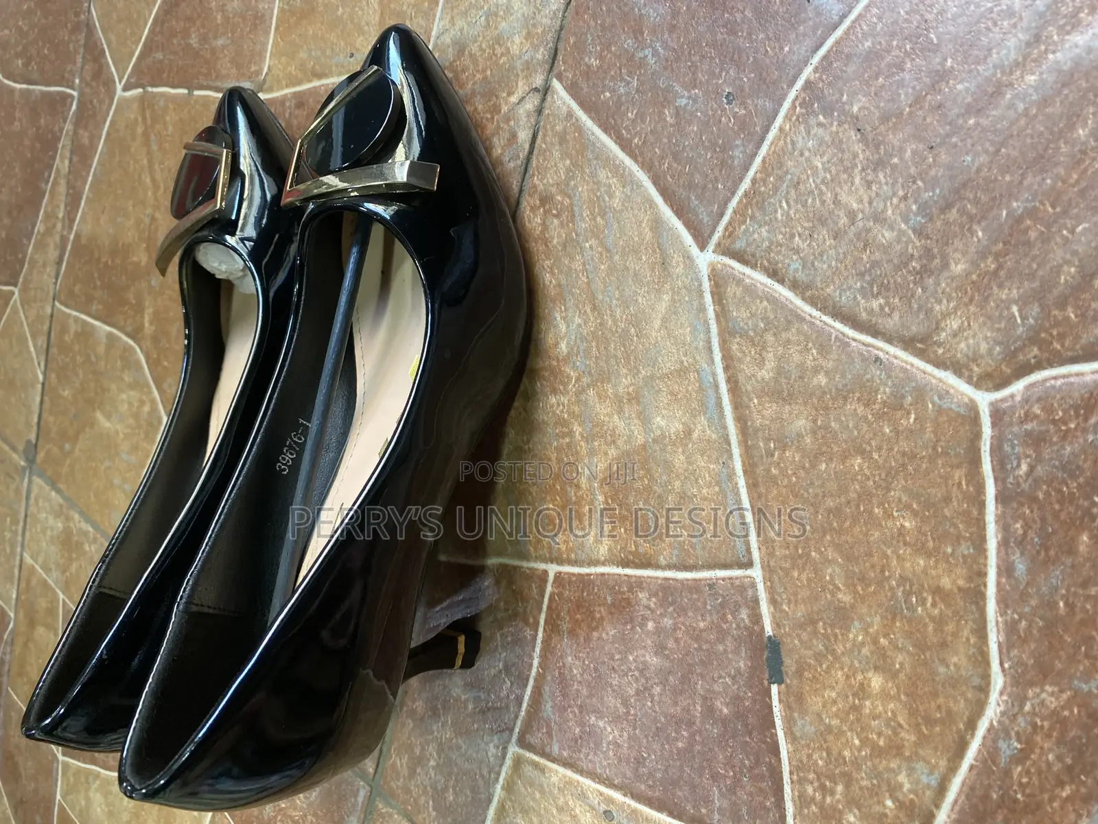 Onyx Elegance Kitten Heel Pumps