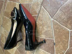 Onyx Elegance Kitten Heel Pumps