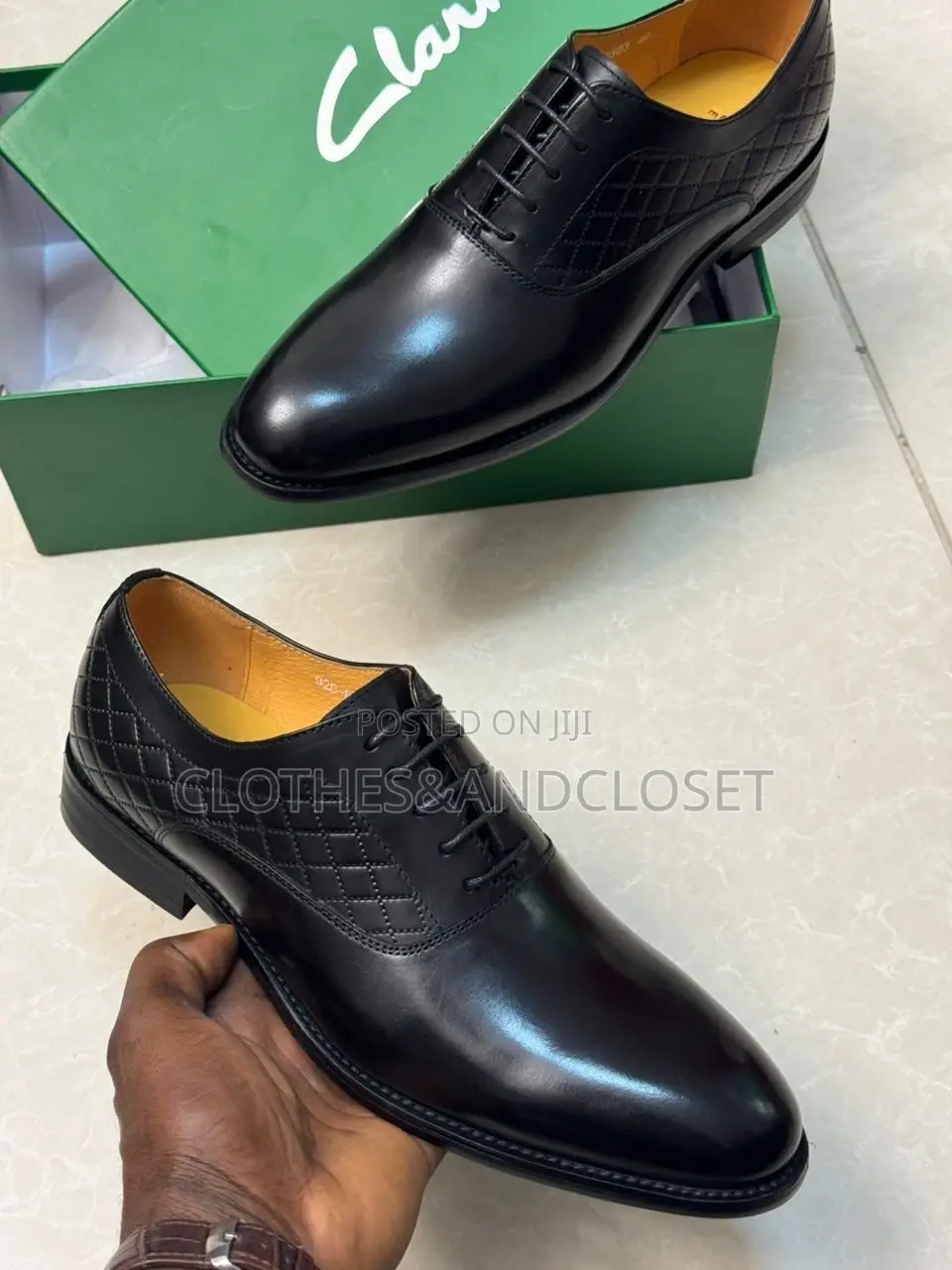 Men's Black Leather Oxford Shoes Are Branded as Clarks