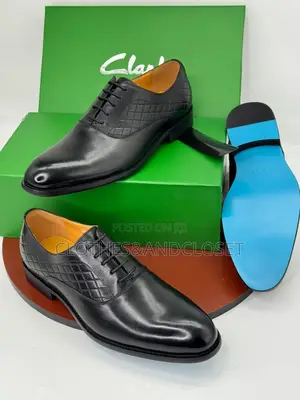 Men's Black Leather Oxford Shoes Are Branded as Clarks