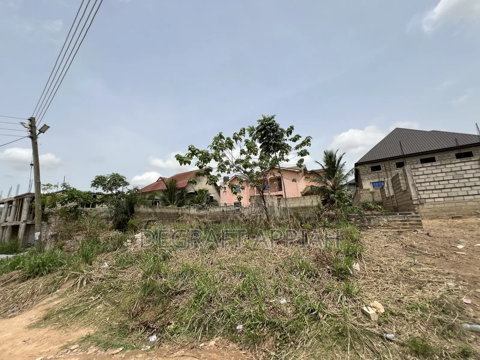 Full Plot With an Old Structure for Sale at Denkyemuoso Near Kwadaso