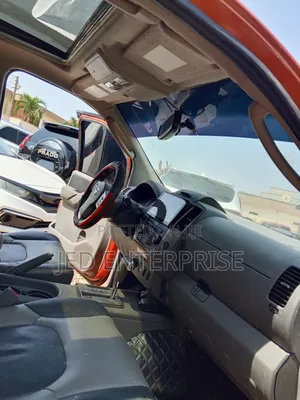Nissan Frontier 2011 Orange