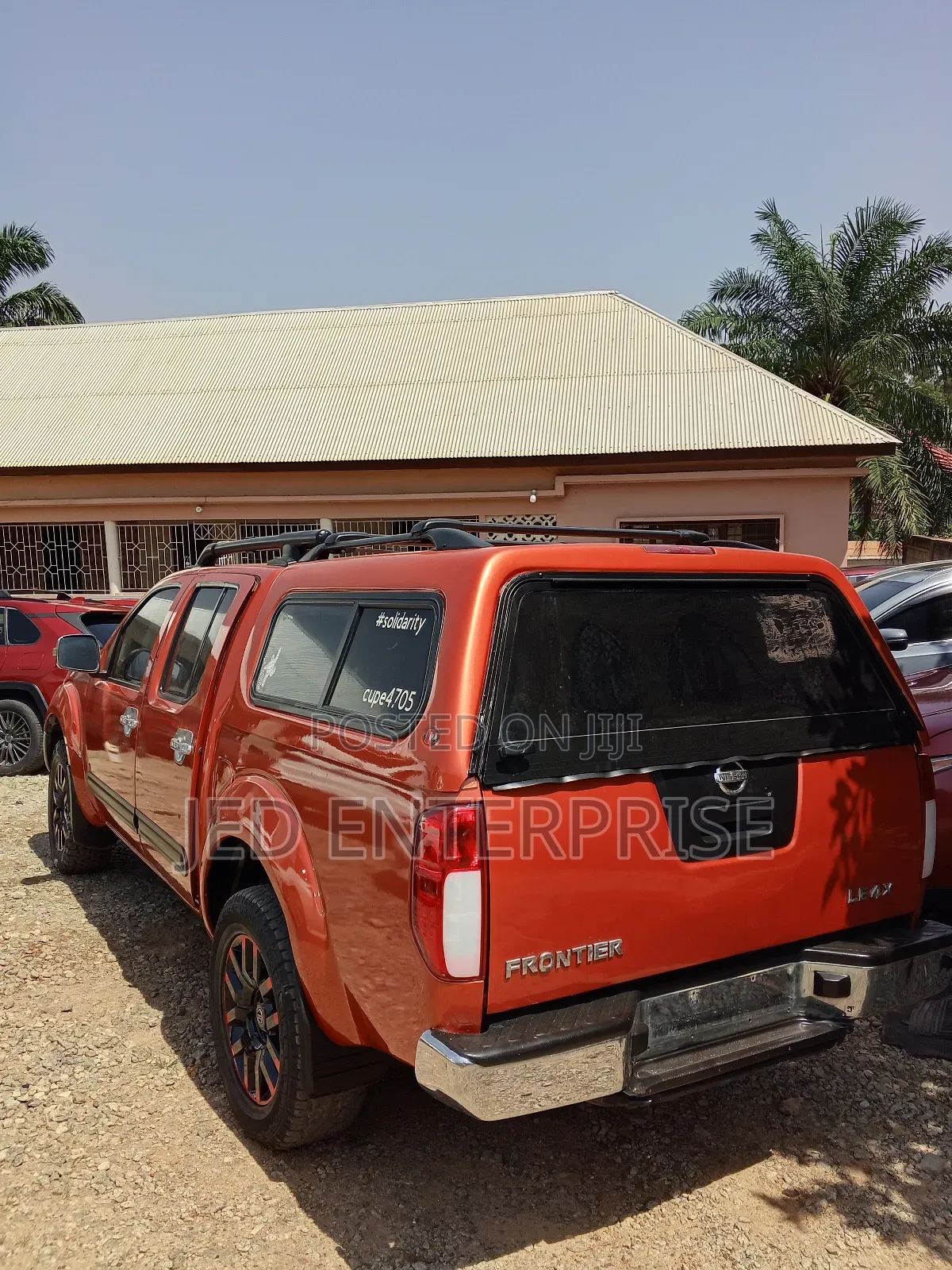 Nissan Frontier 2011 Orange