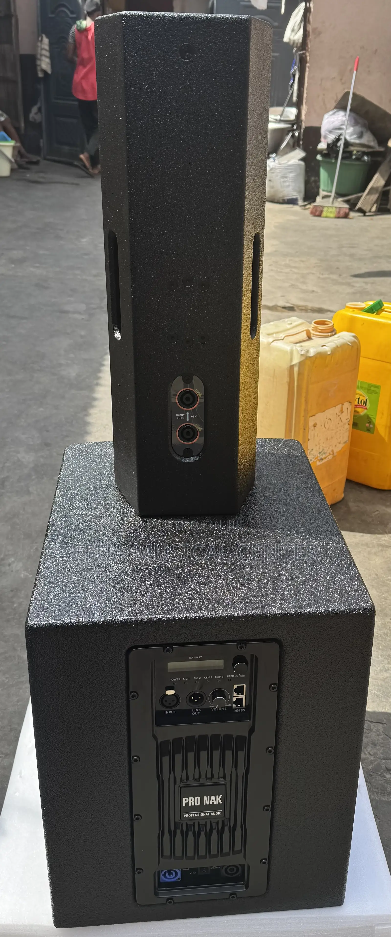 Pro Nak Pa System Featuring Line Arrays and Subwoofer.