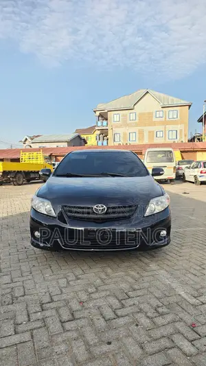 Toyota Corolla Base 4dr Sedan (1.8L 4cyl 5M) 2010 Black