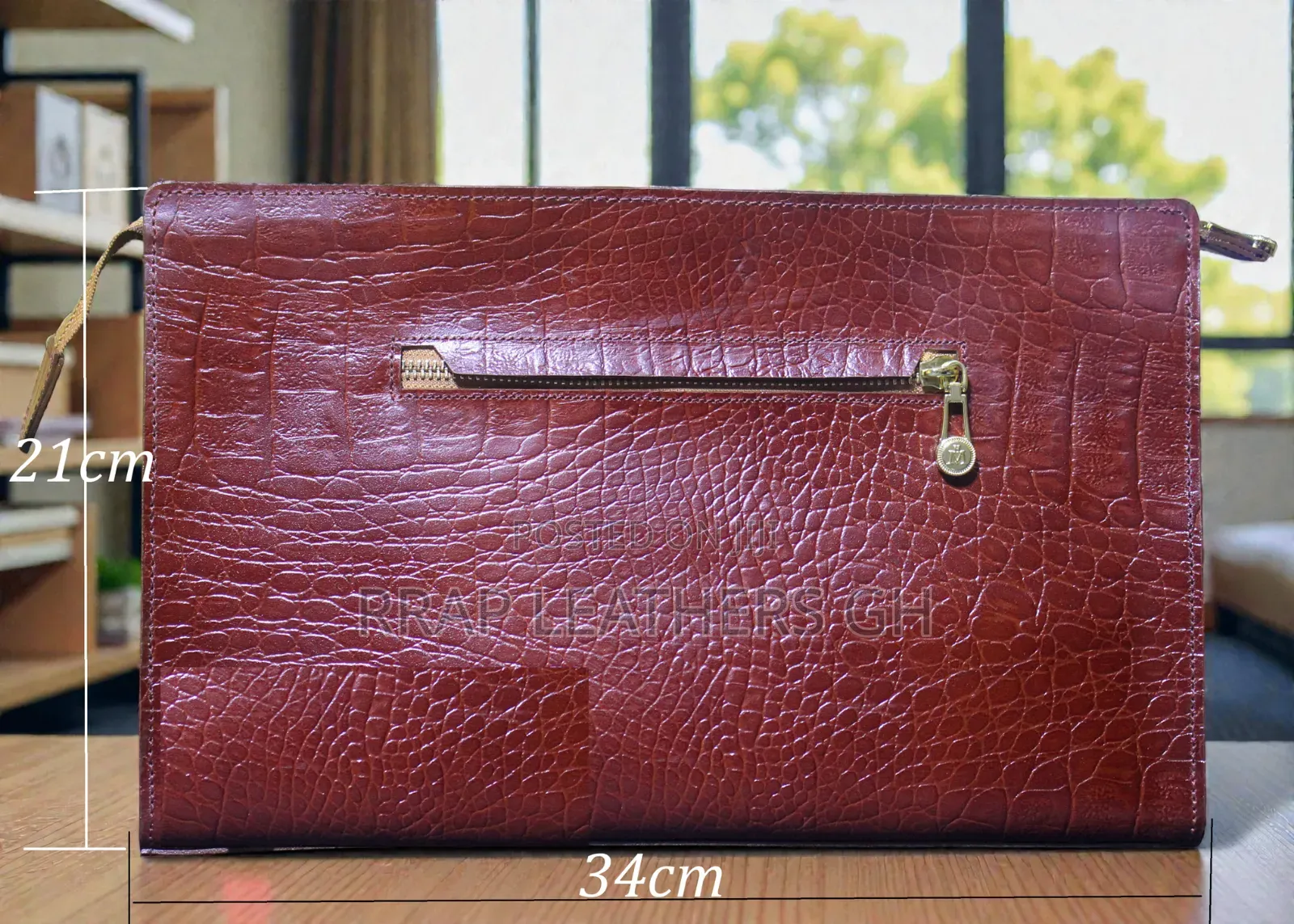 Okatakyie B Clutch Bag