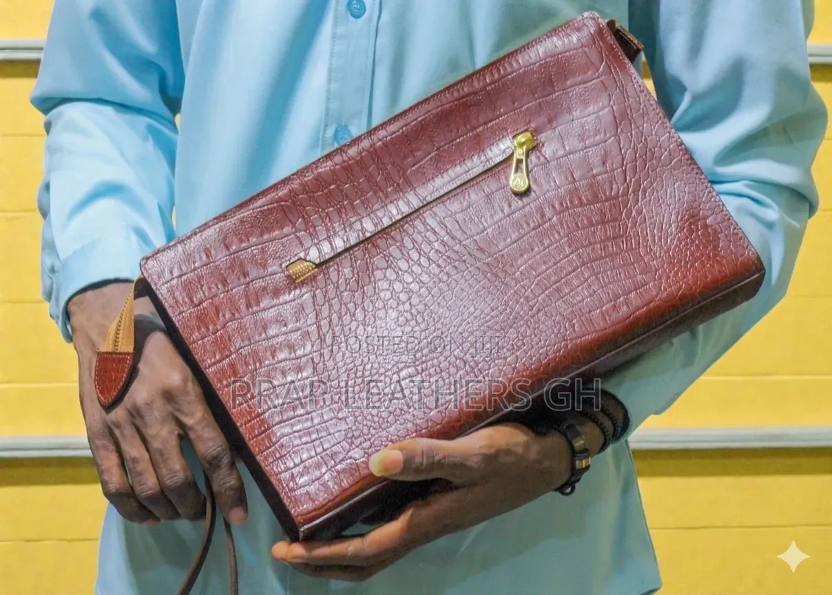 Okatakyie B Clutch Bag