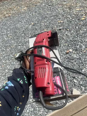 Used Red Electric Oscillating Multi-Tool,