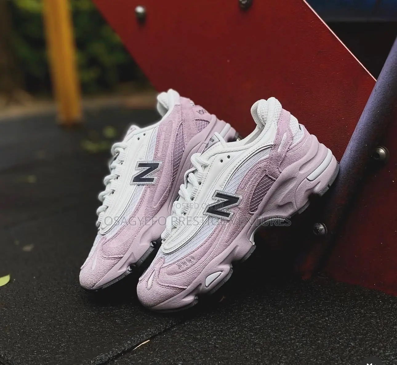 New Balance 1000 Sneakers (Pink/White Colorway).