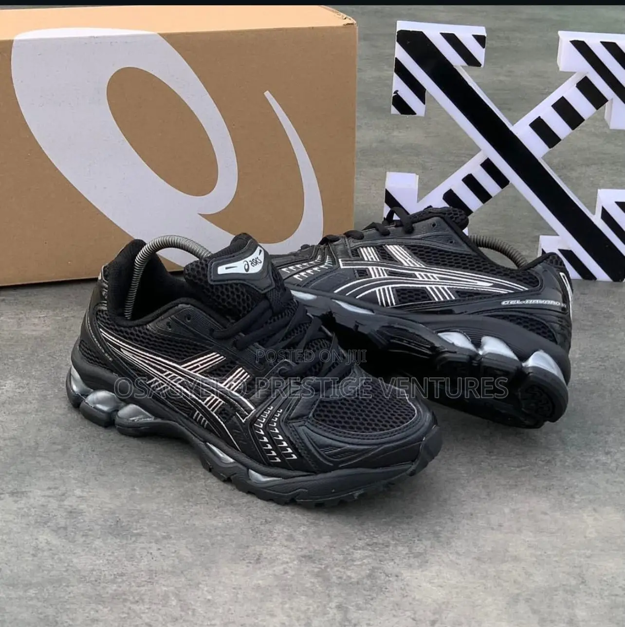 Asics Gel-Kayano 14 (Black/Silver Colorway).