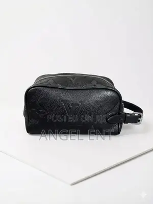 Louis Vuitton Dopp Kit Hand Bags Available as Seen (Location: Kumasi)