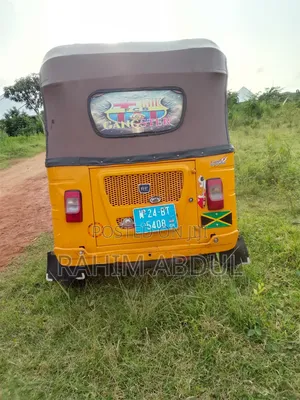 Bajaj RE 2024 Yellow