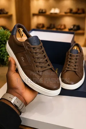Coffee and White Lacoste Men's Sleek Sneakers