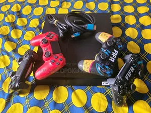 Ps4 With 2 Controllers and 8 Games Installed
