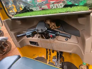 Bajaj RE 2024 Yellow