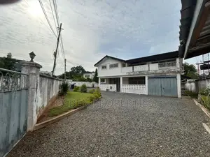 A. 0.23 Acre Land for Sale, With an Old Building