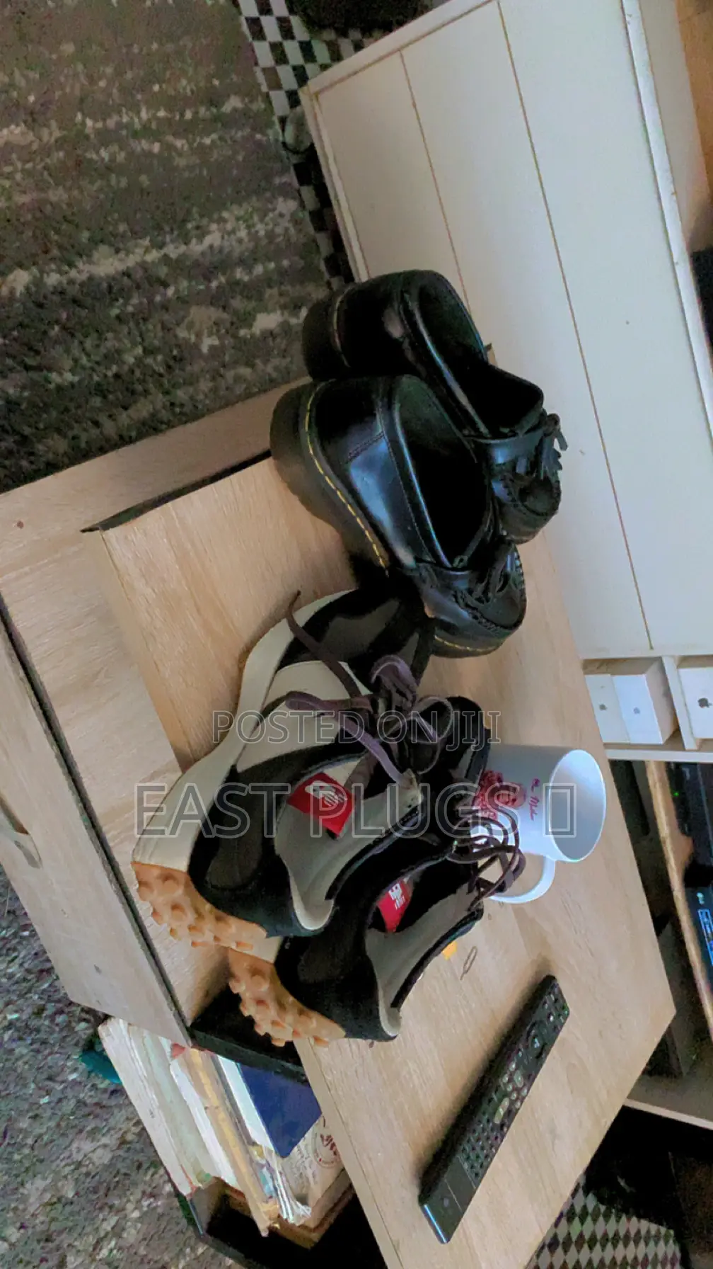 Dr. Martens Shoe and New Balance Sneakers