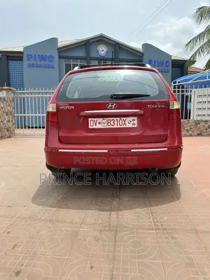Hyundai Elantra GS Coupe FWD (1.8L 4cyl 6A) 2013 Red