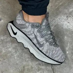 Nike Motiva Grey
