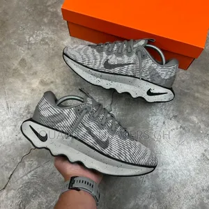 Nike Motiva Grey