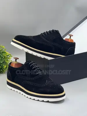 Timberland Brogue Shoes Featuring a Black Suede Upper