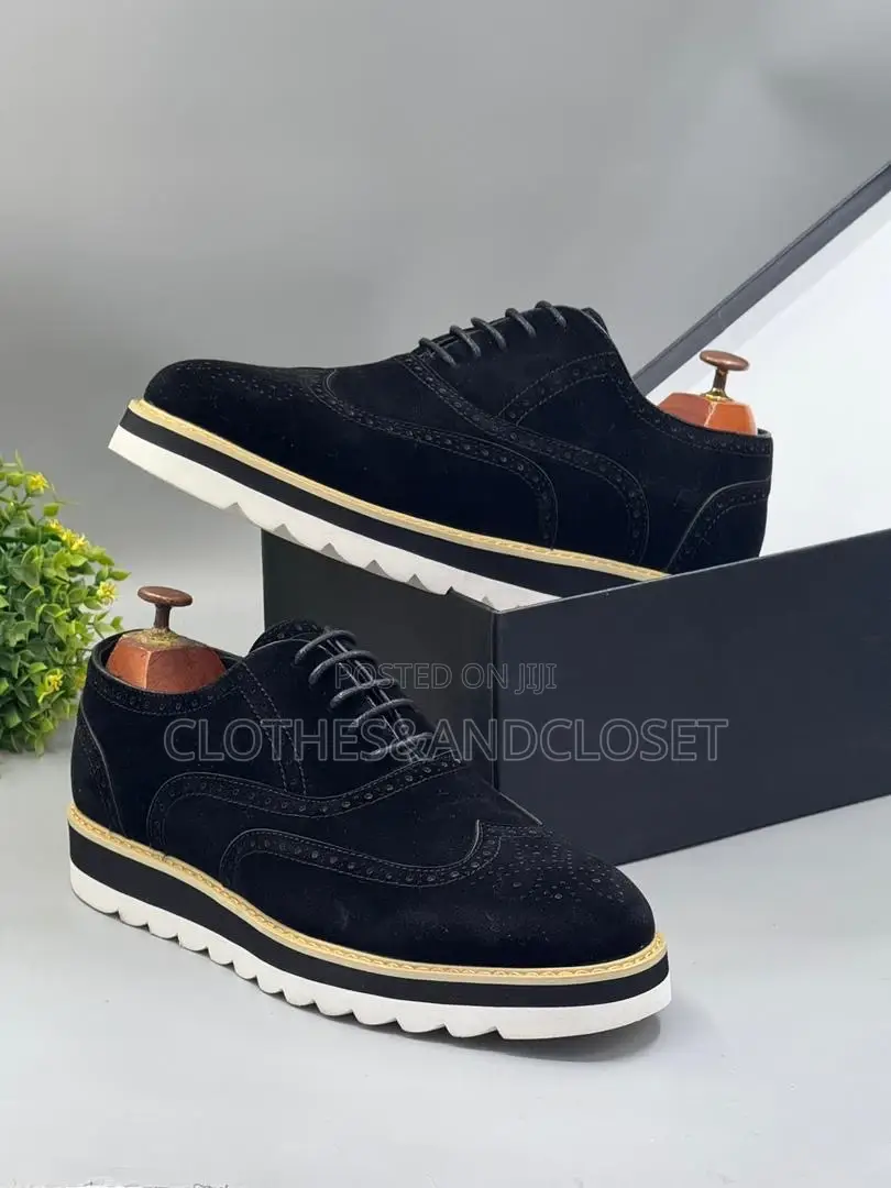 Timberland Brogue Shoes Featuring a Black Suede Upper