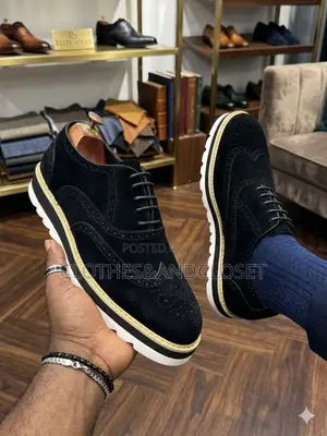 Timberland Brogue Shoes Featuring a Black Suede Upper