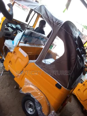 New Bajaj RE 2025 Yellow