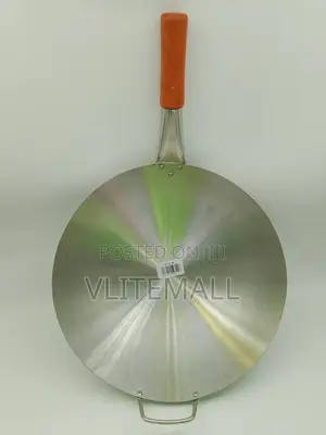 An Aluminum Tawa (Flat Frying Pan) Long Wooden Handle a Small Loop.