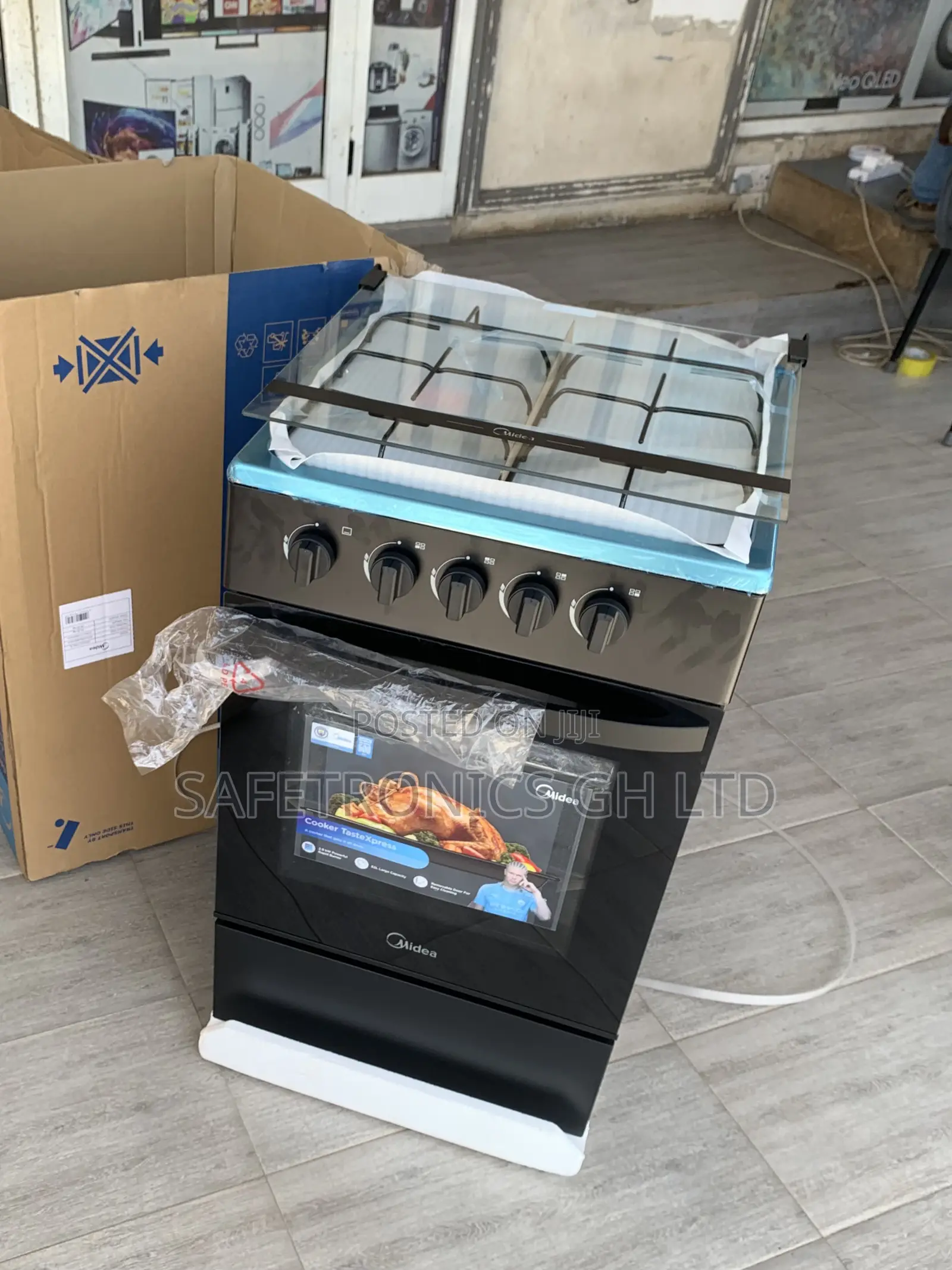 Grab Elegant 50x50 Black Midea 4-Burner Gas Cookers