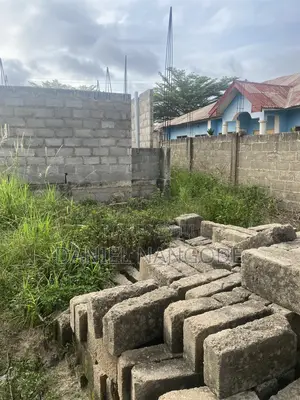 Land With Uncompleted Building at Nsenie Off Asokore Mampong for Sale