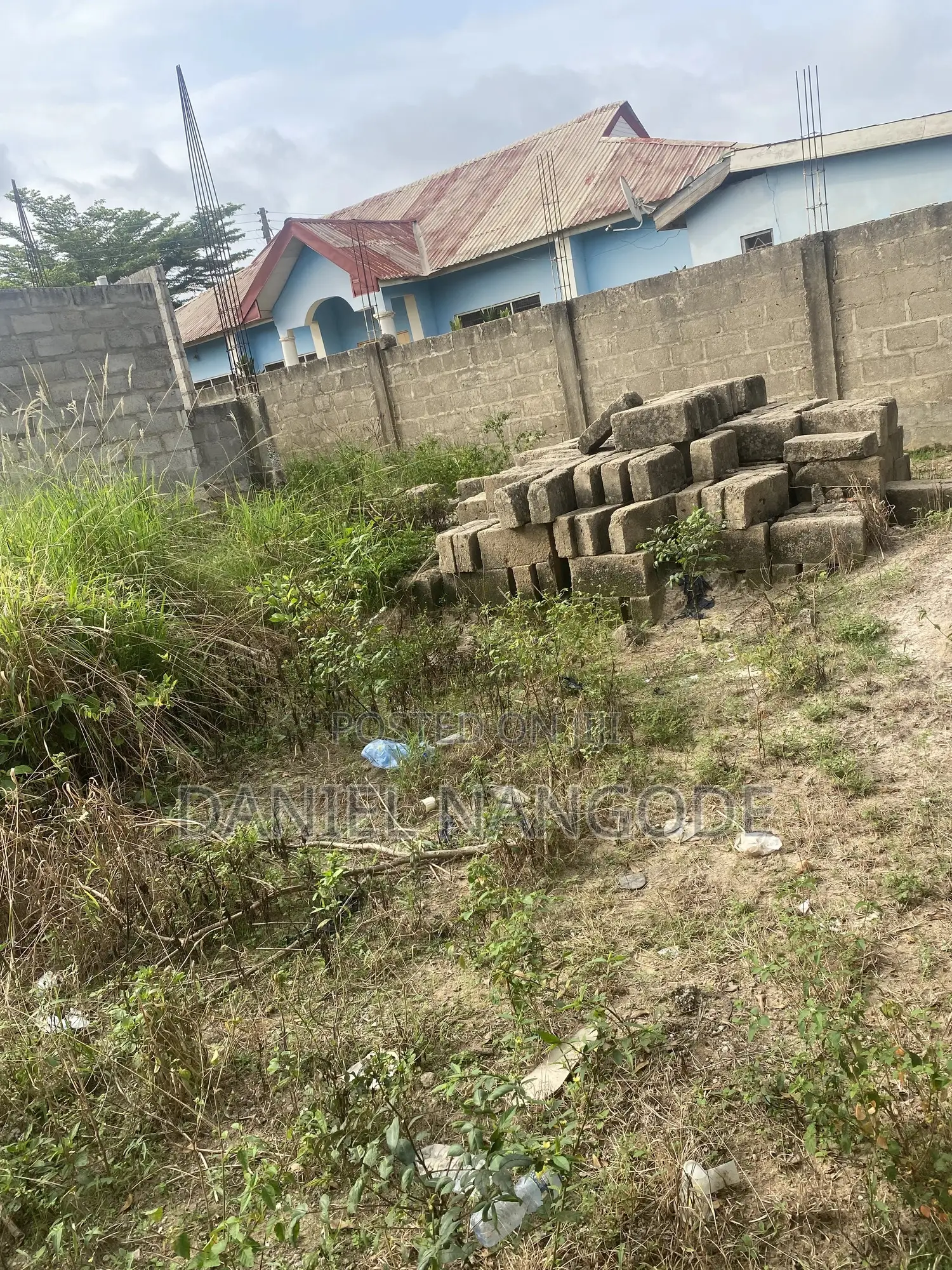 Land With Uncompleted Building at Nsenie Off Asokore Mampong for Sale