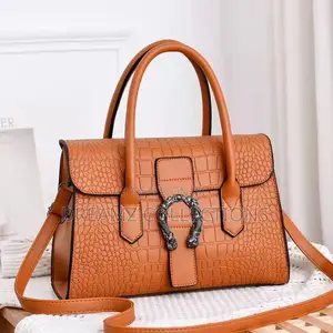 Regal Twin Buckle Handbag