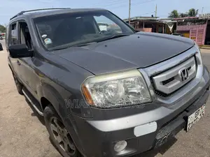 Honda Pilot Touring 4dr SUV 4WD (3.5L 6cyl 5A) 2009 Silver