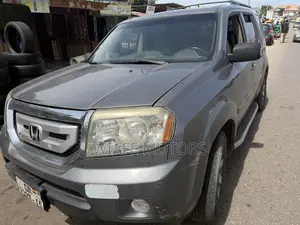Honda Pilot Touring 4dr SUV 4WD (3.5L 6cyl 5A) 2009 Silver
