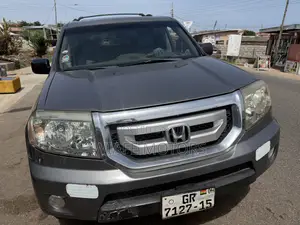 Honda Pilot Touring 4dr SUV 4WD (3.5L 6cyl 5A) 2009 Silver