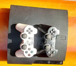Ps3 With 2 Controllers (10 Games)
