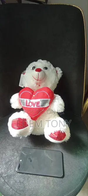 White Red Teddy Bear With "Love" Inscribed on It.Dimensions 30×24cm