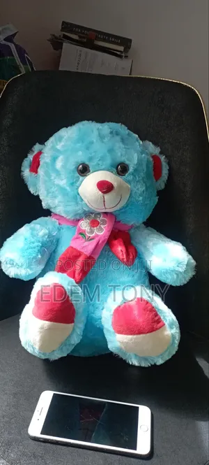 A Fluffy Sky Blue Teddy Bear With Dimensions: 43×31cm