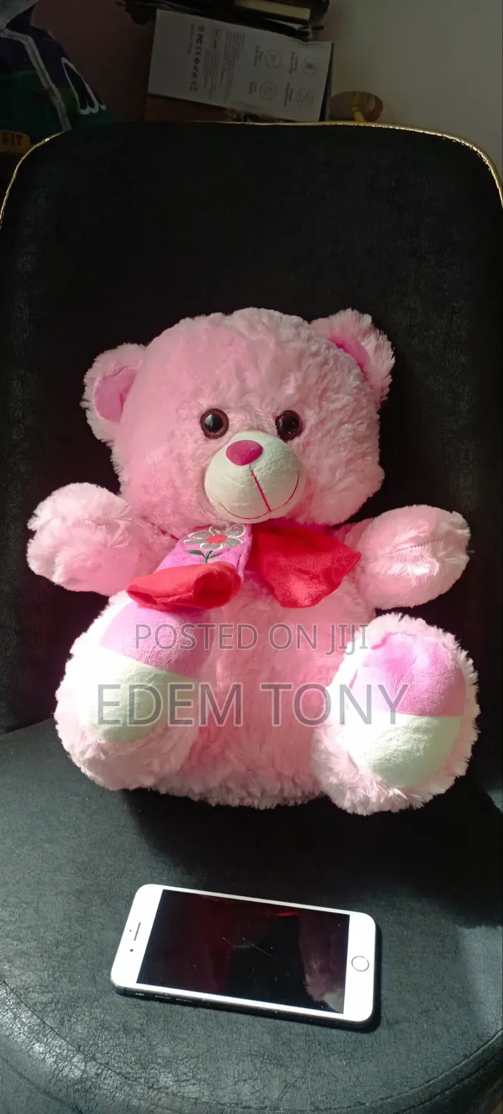 A Fluffy Pink Teddy Bear With Dimensions: 43 by 31cm