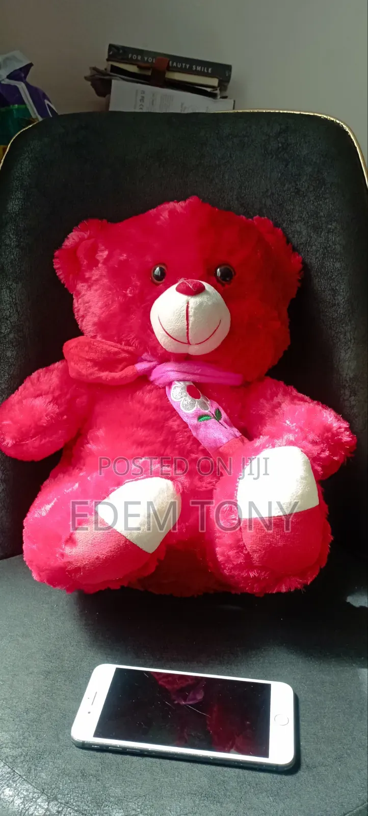 A Red Fluffy Teddy Bear With Dimensions 43×31cm