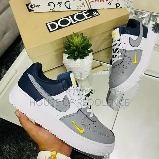 The Nike Air Force 1 Low Tri-Color Sneakers