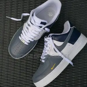 The Nike Air Force 1 Low Tri-Color Sneakers