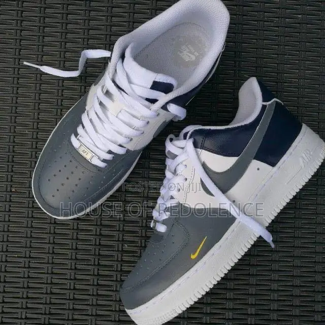 The Nike Air Force 1 Low Tri-Color Sneakers