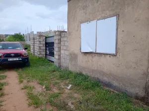 Titled, Walled, Gated Plot With Single Room at Nsakina Route Accra
