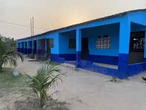 Two Plots Of Land With 6 Classroom Blocks, An Office