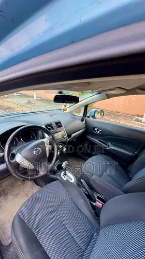 Nissan Versa 1.6 SL 4dr Sedan (1.6L 4cyl CVT) 2014 Blue