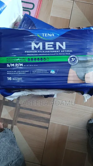 Tena Men Premium Fit/ Adjustment Optimal .Medium Size